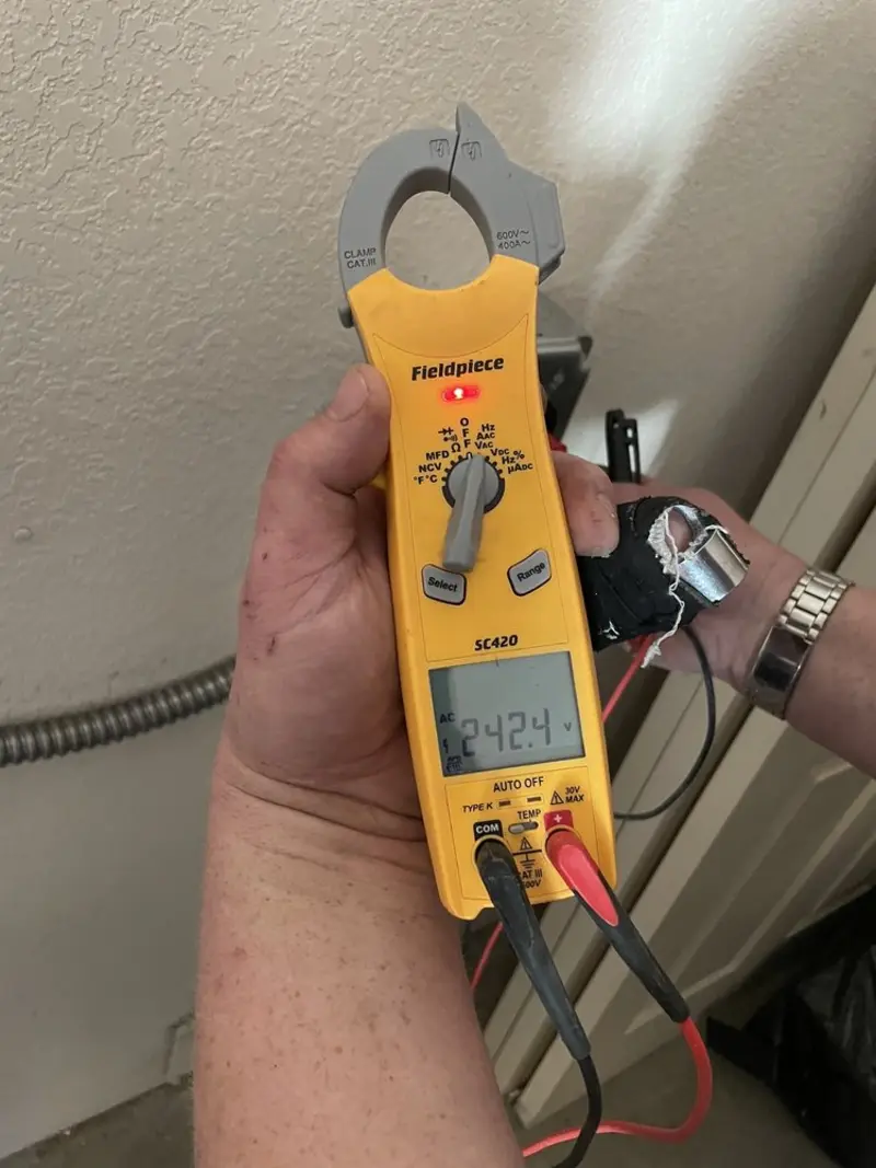 Voltage testing with clamp meter during Recessed Lighting Installation in Humboldt